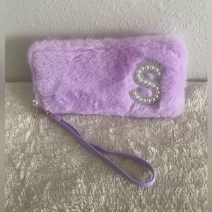 Claire's Lavender Furry Wristlet